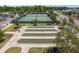A bird's-eye view showcasing the bocce ball and tennis courts within the community at 6342 Whittle Ct, The Villages, FL 32163