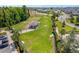 Aerial view of the community dog park featuring a gazebo and fenced areas for pets at 6342 Whittle Ct, The Villages, FL 32163