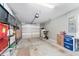 Well-lit garage with ample storage space, ideal for organization and convenience at 6342 Whittle Ct, The Villages, FL 32163