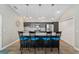 Spacious kitchen island with barstool seating and ample counter space at 6342 Whittle Ct, The Villages, FL 32163