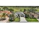Aerial shot of a house with a well-kept yard near a golf course at 685 Winifred Way, The Villages, FL 32162