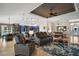 Spacious living room featuring tile floors and an open floor plan at 685 Winifred Way, The Villages, FL 32162