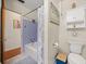 Cozy bathroom with a tub/shower combination and a built-in medicine cabinet at 7115 Lake Ola Dr, Mount Dora, FL 32757