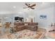 Spacious living area featuring an area rug with hardwood floors and neutral tones at 814 Olive Ave, Fruitland Park, FL 34731