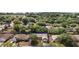 Aerial view showcasing the property within a mature tree landscape at 831 Whisper Sound, Minneola, FL 34715