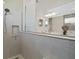 The bathroom features a walk-in shower with a glass door and modern fixtures at 8433 Sw 98Th Terrace Rd, Ocala, FL 34481