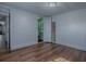 Spacious bedroom with connected bathroom space, offering privacy and potential for a Primary suite conversion at 8901 Se 144Th Ln, Summerfield, FL 34491