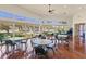 Bright community room with large windows providing views of the grounds, featuring seating for residents at 1001 Harmony Ln, Clermont, FL 34711