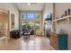 Open living room with high ceilings, large windows, fireplace, and tile flooring at 1001 Harmony Ln, Clermont, FL 34711