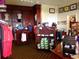 Golf pro shop with clothing and accessories on display, set in a carpeted and well-lit space at 1001 Harmony Ln, Clermont, FL 34711