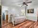 Spare bedroom with decorative flooring, ceiling fan, and neutral walls at 1003 Parker Pl, Lady Lake, FL 32159