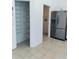 Walk-in pantry with wire shelving, offering ample storage, conveniently located near the kitchen at 1040 Soaring Eagle Ln, Kissimmee, FL 34746