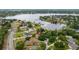 Aerial view of the property highlighting its proximity to the lake and the surrounding neighborhood at 11024 Windchime Cir, Clermont, FL 34711