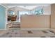 Spacious living room with tile flooring, offering seamless transition to other rooms at 11024 Windchime Cir, Clermont, FL 34711