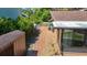 A view of the brick path and an enclosed porch, adding charm and functionality to this outdoor space at 12110 Palmetto Ct, Dunnellon, FL 34432