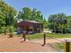 Backyard building with deck and water view at 12110 Palmetto Ct, Dunnellon, FL 34432