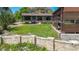 Spacious green yard featuring a patio and boat storage, offering a tranquil outdoor retreat at 12110 Palmetto Ct, Dunnellon, FL 34432