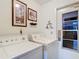 Bright laundry room with new washer and dryer and natural light at 12110 Palmetto Ct, Dunnellon, FL 34432