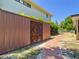 Durable metal and wood storage shed in backyard at 12110 Palmetto Ct, Dunnellon, FL 34432