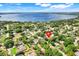 Aerial view showing the property's location within a neighborhood with a large lake nearby at 12346 Lake Valley Dr, Clermont, FL 34711