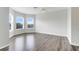 Sunny bedroom with lots of natural light, light gray flooring, and arched windows at 12346 Lake Valley Dr, Clermont, FL 34711