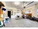 Large two car garage with overhead lighting and plenty of space for projects at 12346 Lake Valley Dr, Clermont, FL 34711