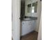 Modern bathroom with a granite countertop and vanity at 1420 Fairway St, The Villages, FL 32162