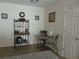 Cozy dining area with a small table and a unique wine rack at 1420 Fairway St, The Villages, FL 32162