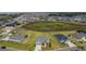 Expansive aerial view of the neighborhood showcasing the home's location within a large community at 1422 Jeremy Cir, The Villages, FL 34762