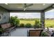 Relaxing screened lanai providing beautiful views of the large backyard and green space at 1422 Jeremy Cir, The Villages, FL 34762