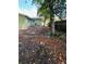 Photo of the backyard with a mix of grassy areas and patches of foliage at 14536 Sw 34Th Terrace Rd, Ocala, FL 34473