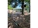 Image of a spacious backyard with plenty of shaded areas provided by the mature trees at 14536 Sw 34Th Terrace Rd, Ocala, FL 34473