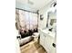 Stylish bathroom with modern vanity, decorative shower curtain, and sleek fixtures at 14536 Sw 34Th Terrace Rd, Ocala, FL 34473
