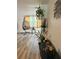 Relaxing living room featuring modern decor, plant accents, and a unique hanging chair at 14536 Sw 34Th Terrace Rd, Ocala, FL 34473