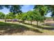 Community park with playground and walking path around a lake at 15918 Summit Ct, Clermont, FL 34711