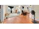 Spacious living room featuring an area rug and hardwood flooring at 16724 Highland Ave, Montverde, FL 34756