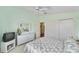 Bedroom with closet and bright natural light at 1706 Moreno Pl, The Villages, FL 32159
