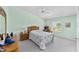 Comfortable bedroom with natural light and ample space for rest and relaxation at 1706 Moreno Pl, The Villages, FL 32159