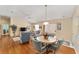 Open-concept living space with dining area flowing into a comfortable living room at 1706 Moreno Pl, The Villages, FL 32159