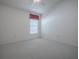 Bedroom showcasing neutral carpet and lots of natural light at 1741 Pennecamp Dr, The Villages, FL 32162
