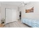 Bright bedroom with a closet, comfortable bed, and stylish decorations at 1814 Marquez Loop, The Villages, FL 32159