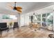 Spacious enclosed patio with fans and views of the landscaped backyard at 1814 Marquez Loop, The Villages, FL 32159