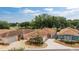A row of colorful single-story homes nestled in a vibrant community near a golf course at 1814 Marquez Loop, The Villages, FL 32159