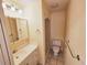 Bathroom featuring an updated vanity with drawers, a medicine cabinet, and a shower at 2037 Lakeshore Dr, Mount Dora, FL 32757