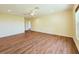 Open bedroom with wood-look flooring, recessed lighting, and a ceiling fan at 2037 Lakeshore Dr, Mount Dora, FL 32757
