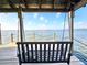 Dockside swing on the water overlooking the lake at 2037 Lakeshore Dr, Mount Dora, FL 32757