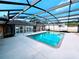Enjoy this screened-in pool with a spacious deck, perfect for relaxation and outdoor fun at 2037 Lakeshore Dr, Mount Dora, FL 32757