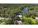 Aerial view of property with defined yard lines and a glimpse of the waterway at 2121 Suzanne Dr, Mount Dora, FL 32757