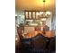 Dining room featuring an open concept with a view of the modern kitchen at 2121 Suzanne Dr, Mount Dora, FL 32757