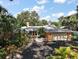 Lovely one-story home featuring an attached two-car garage and a well-manicured lawn at 2121 Suzanne Dr, Mount Dora, FL 32757